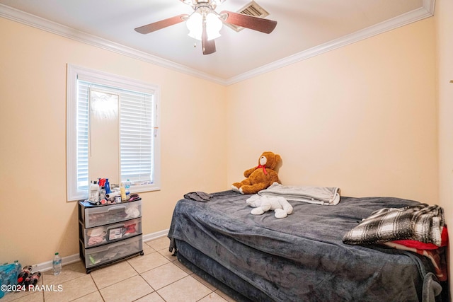 bedroom with crown molding, ceiling fan, and light tile patterned flooring