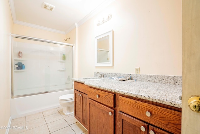 full bathroom featuring combined bath / shower with glass door, tile patterned flooring, ornamental molding, vanity, and toilet