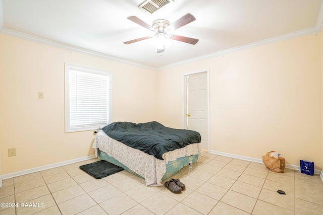 tiled bedroom featuring ceiling fan and ornamental molding