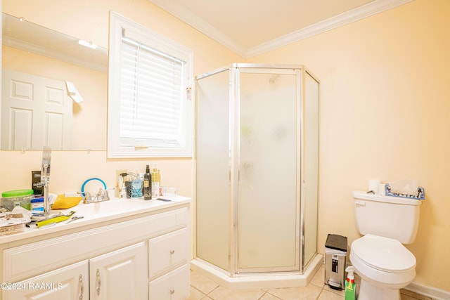 bathroom featuring ornamental molding, toilet, a shower with shower door, and vanity