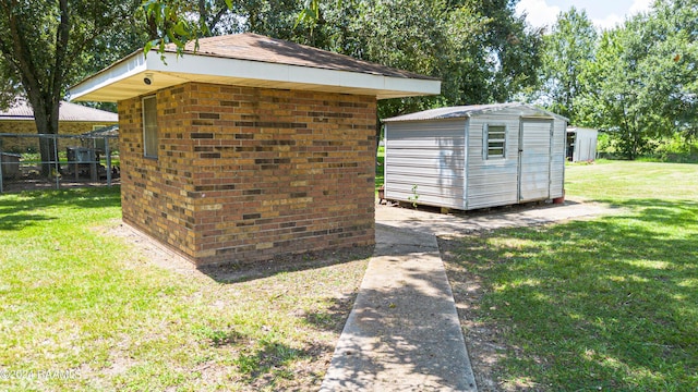 view of outdoor structure with a yard