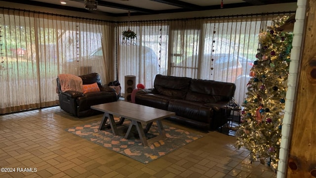 living room with brick floor