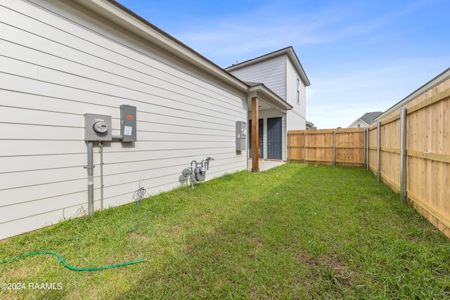 exterior space featuring a fenced backyard