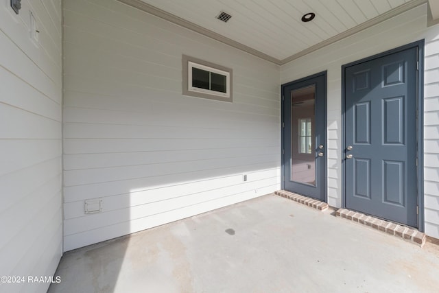 doorway to property featuring visible vents