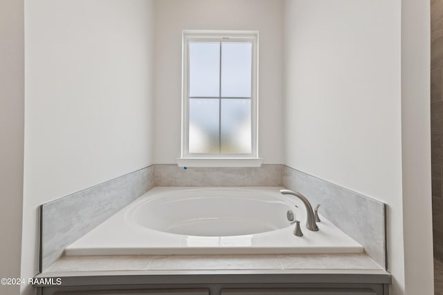 bathroom featuring a garden tub