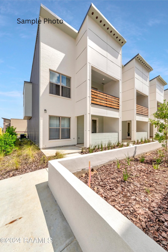 exterior space with a balcony