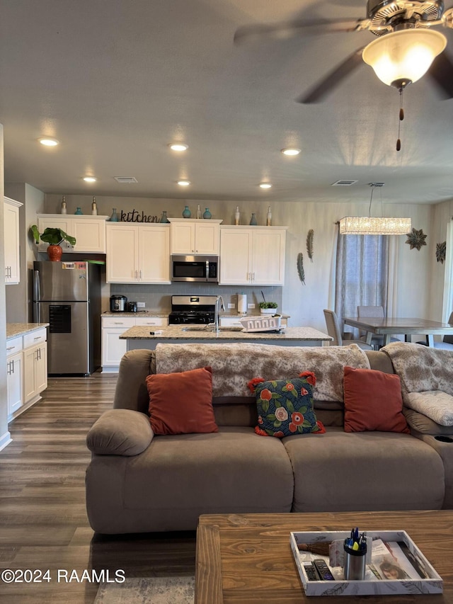 3134 Asbury Cir, Lake Charles, LA 70607 - living area with recessed lighting, ceiling fan, and dark wood-style flooring