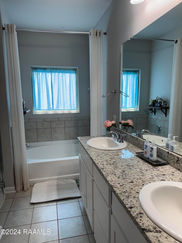 bathroom featuring tile patterned flooring, separate shower and tub, and vanity