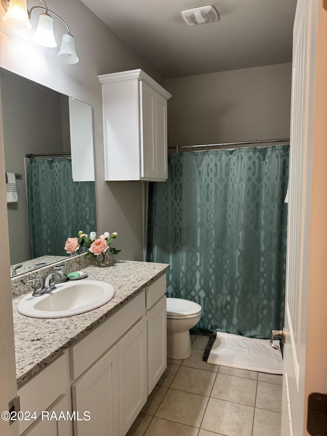 3134 Asbury Cir, Lake Charles, LA 70607 - full bath with tile patterned flooring, visible vents, toilet, vanity, and a shower with shower curtain