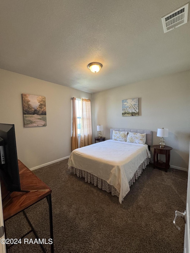 3134 Asbury Cir, Lake Charles, LA 70607 - carpeted bedroom with baseboards, visible vents, and a textured ceiling