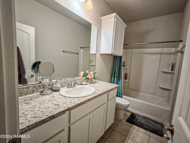 full bathroom featuring tile patterned flooring, vanity, shower / bath combo with shower curtain, and toilet