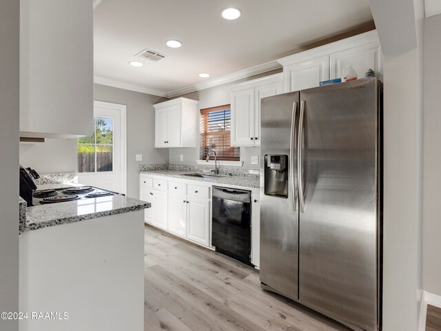 kitchen featuring light wood-type flooring, stainless steel appliances, sink, light stone countertops, and white cabinets