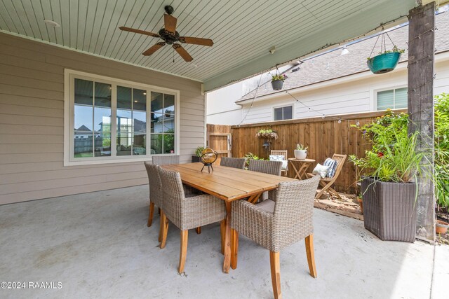 view of patio featuring ceiling fan