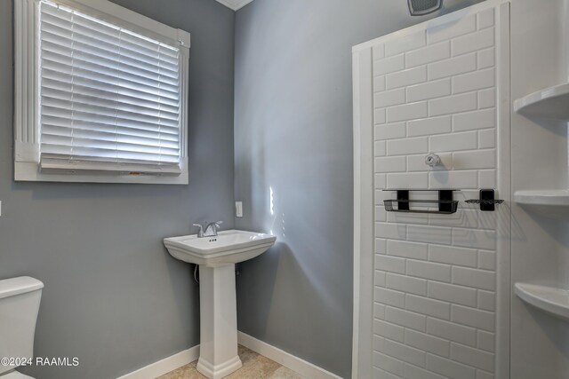 bathroom with sink and toilet