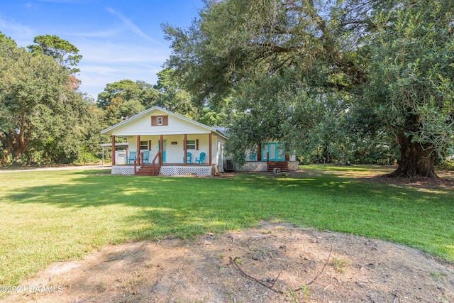 view of front of home featuring a front yard and covered porch