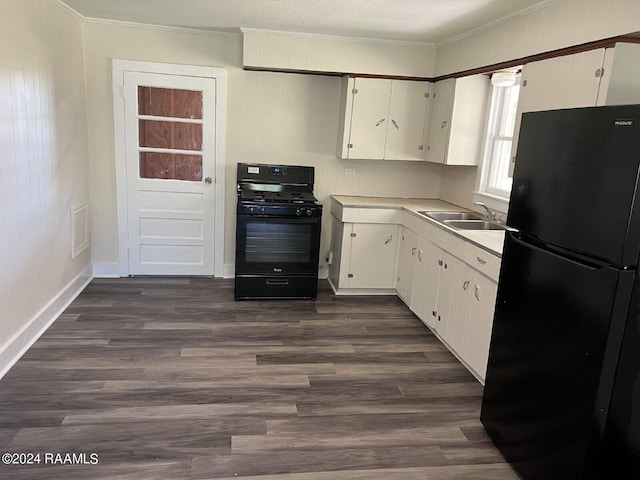 kitchen with sink, crown molding, black appliances, and white cabinets