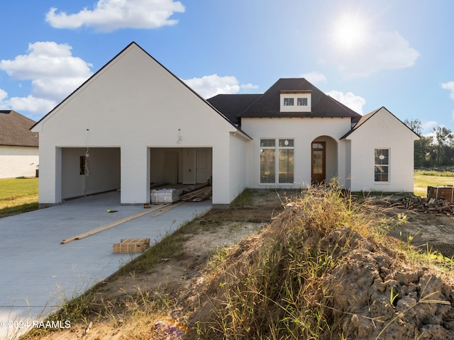 view of front of house featuring central AC unit