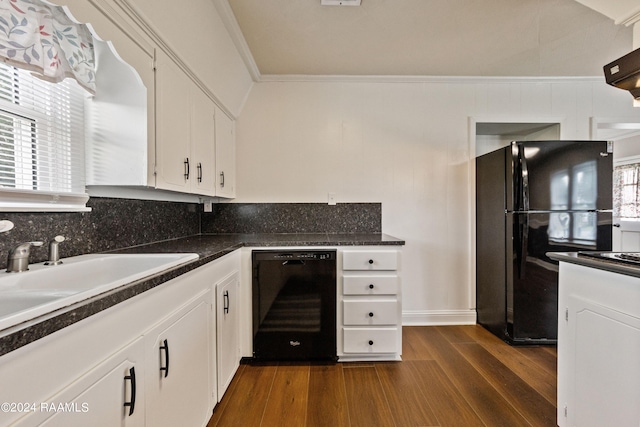 kitchen featuring dark hardwood / wood-style floors, white cabinetry, sink, black appliances, and crown molding