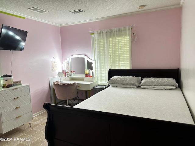 bedroom with ornamental molding and a textured ceiling