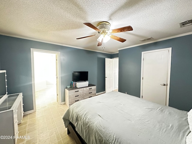 bedroom featuring ornamental molding, a textured ceiling, and ceiling fan