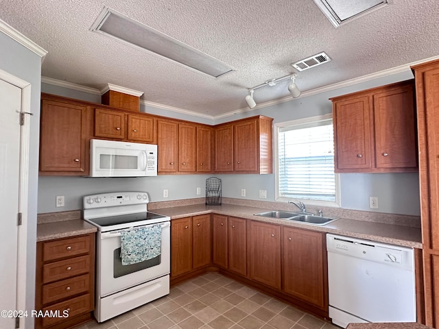 kitchen featuring ornamental molding, sink, a textured ceiling, and white appliances