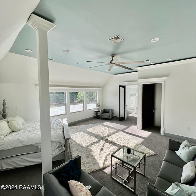 carpeted bedroom featuring ceiling fan and vaulted ceiling