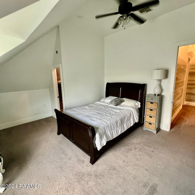 bedroom featuring vaulted ceiling, carpet, and ceiling fan