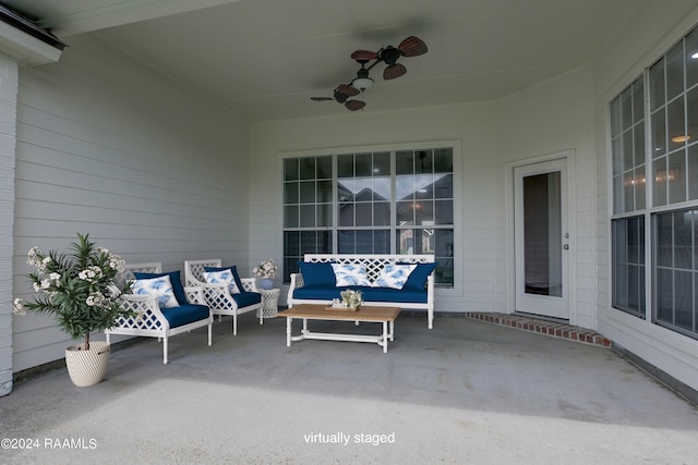 view of patio with outdoor lounge area and ceiling fan