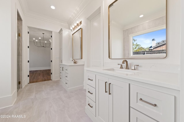 bathroom featuring vanity and ornamental molding