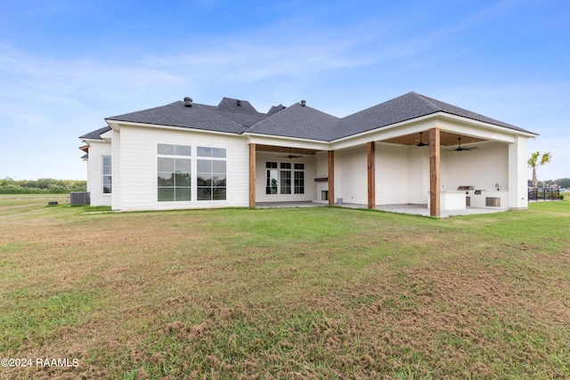 back of house with ceiling fan, a patio, cooling unit, and a yard