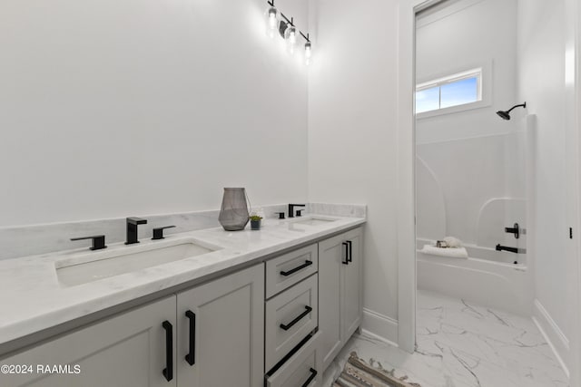 bathroom featuring dual bowl vanity, tile patterned flooring, and bathing tub / shower combination