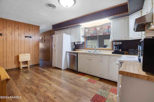 kitchen with white cabinetry, dishwasher, sink, white refrigerator with ice dispenser, and light hardwood / wood-style floors