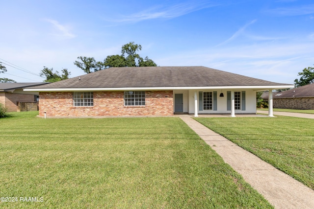 ranch-style home with a front yard