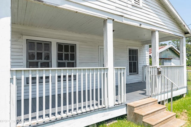 entrance to property with a porch