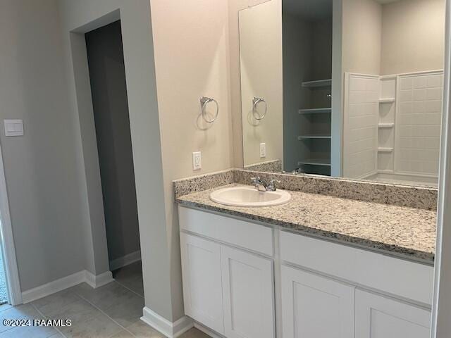 bathroom featuring vanity and tile patterned floors