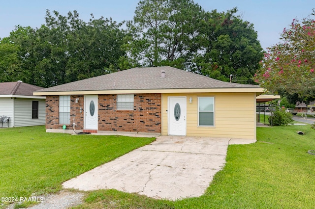 ranch-style house with a front lawn