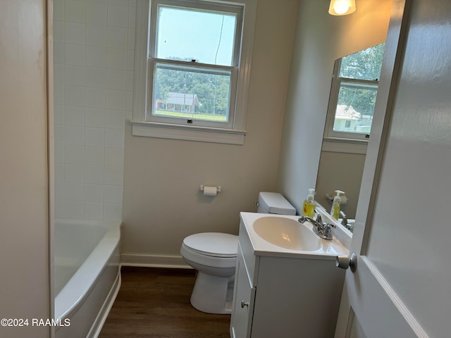 full bathroom featuring shower / bathing tub combination, wood-type flooring, vanity, and toilet