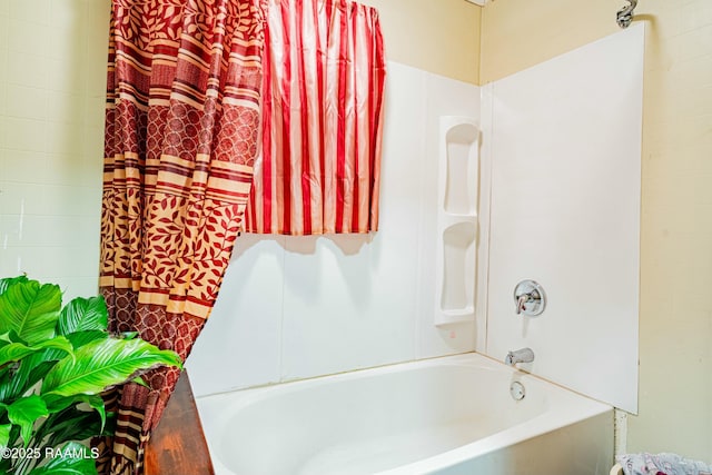 bathroom featuring  shower combination