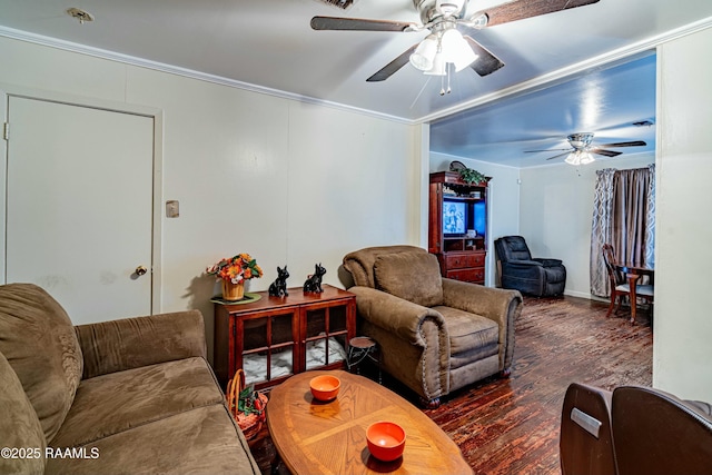 living room featuring ceiling fan, dark hardwood / wood-style floors, and ornamental molding