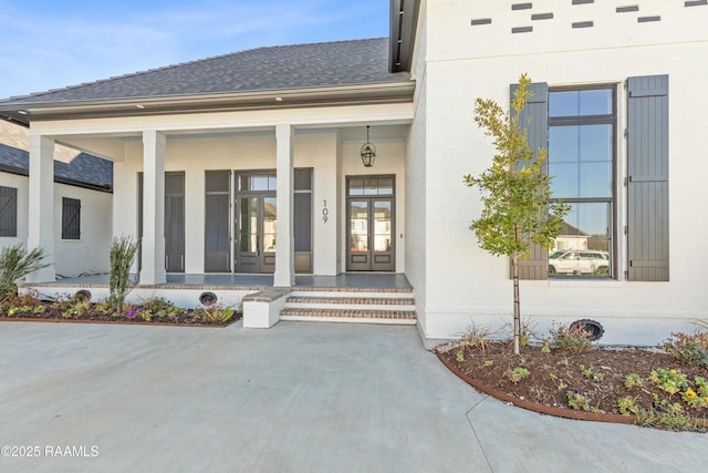 doorway to property featuring a porch