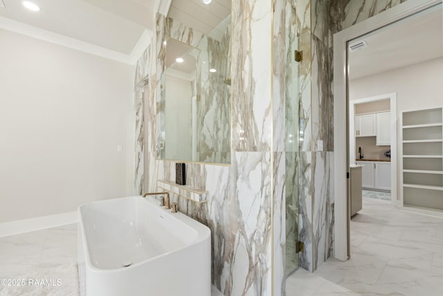 bathroom featuring sink and a shower with door