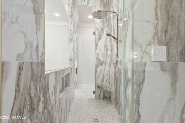 bathroom with a tile shower