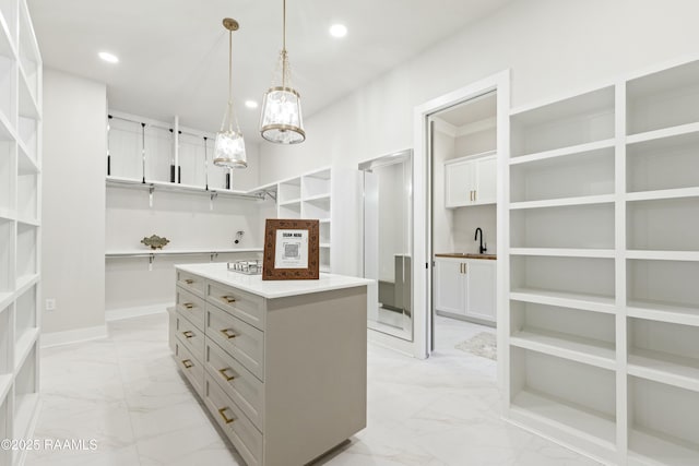 walk in closet with sink