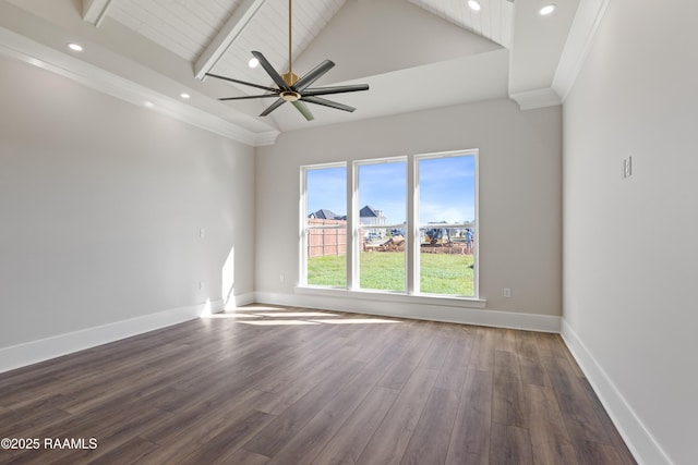 empty room featuring ceiling fan, ornamental molding, dark wood-type flooring, and lofted ceiling with beams