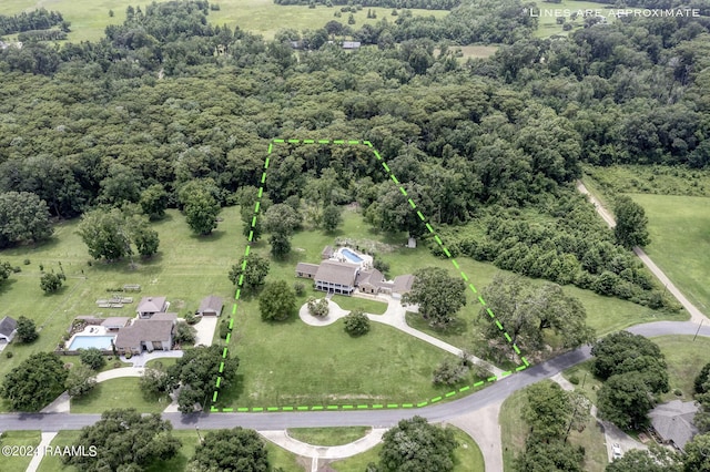 415 Fort Hamilton Dr, Opelousas, LA 70570 - aerial view featuring a forest view