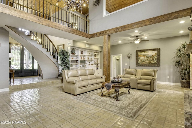 415 Fort Hamilton Dr, Opelousas, LA 70570 - living room with baseboards, recessed lighting, ceiling fan with notable chandelier, and a high ceiling