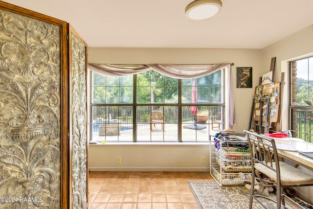 home office with light tile patterned flooring