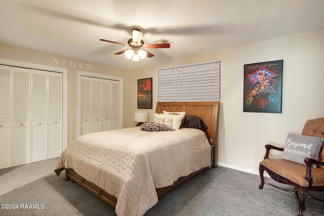 bedroom featuring ceiling fan, two closets, and carpet