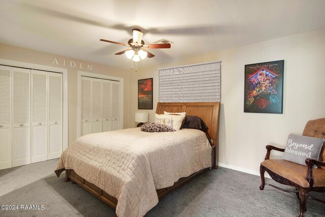 415 Fort Hamilton Dr, Opelousas, LA 70570 - carpeted bedroom featuring two closets, a ceiling fan, and baseboards