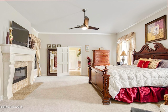 bedroom with a fireplace, ceiling fan, ornamental molding, and light carpet